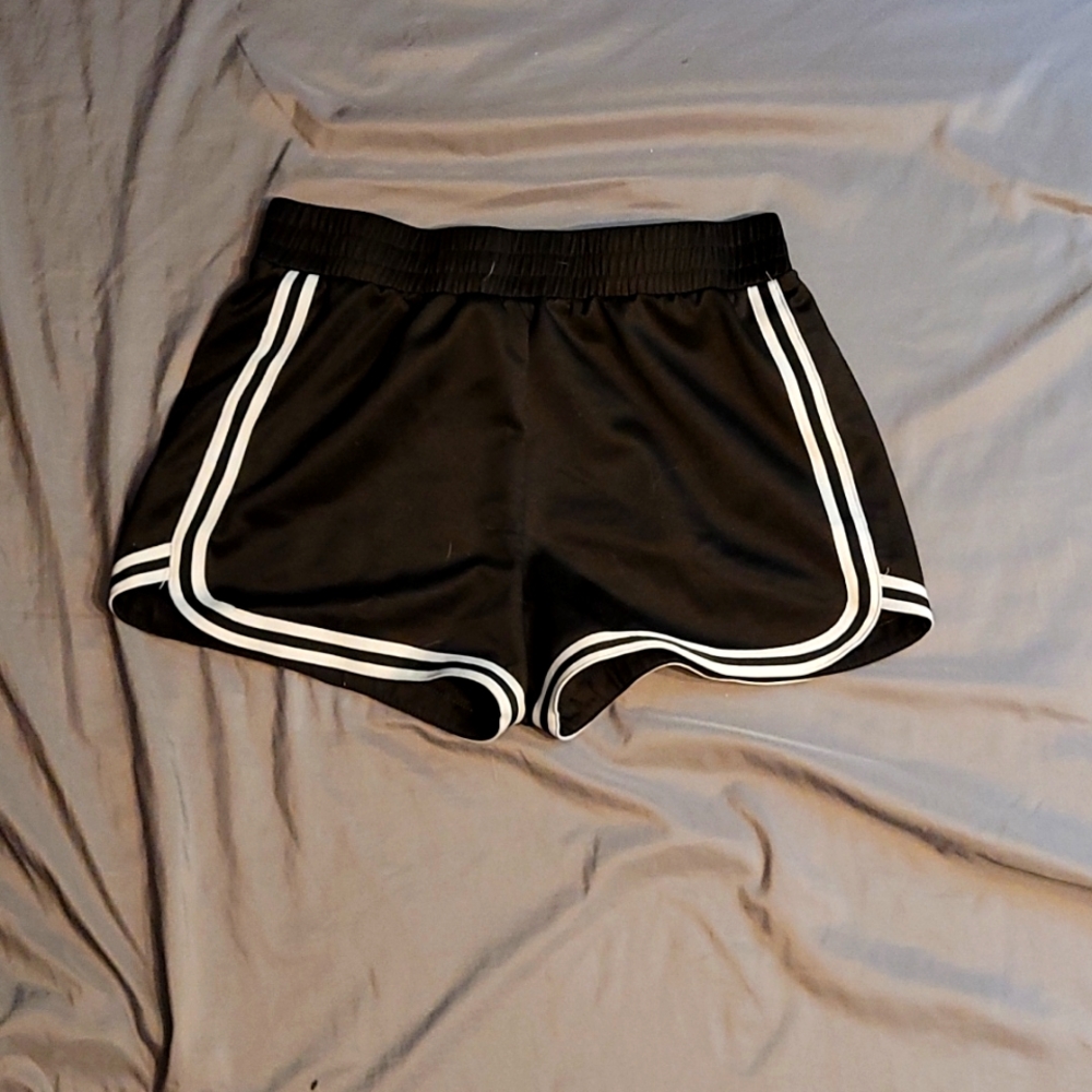 Black shorts with white stripes